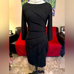 Only worn once. Fitted, long sleeve Calvin Klein